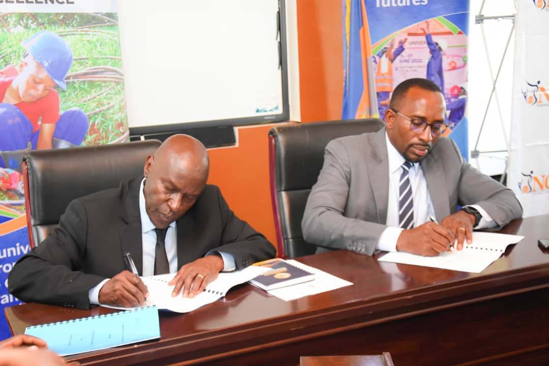 NCS Ambrose Tashobya and VC Eli Katunguka signing agreement